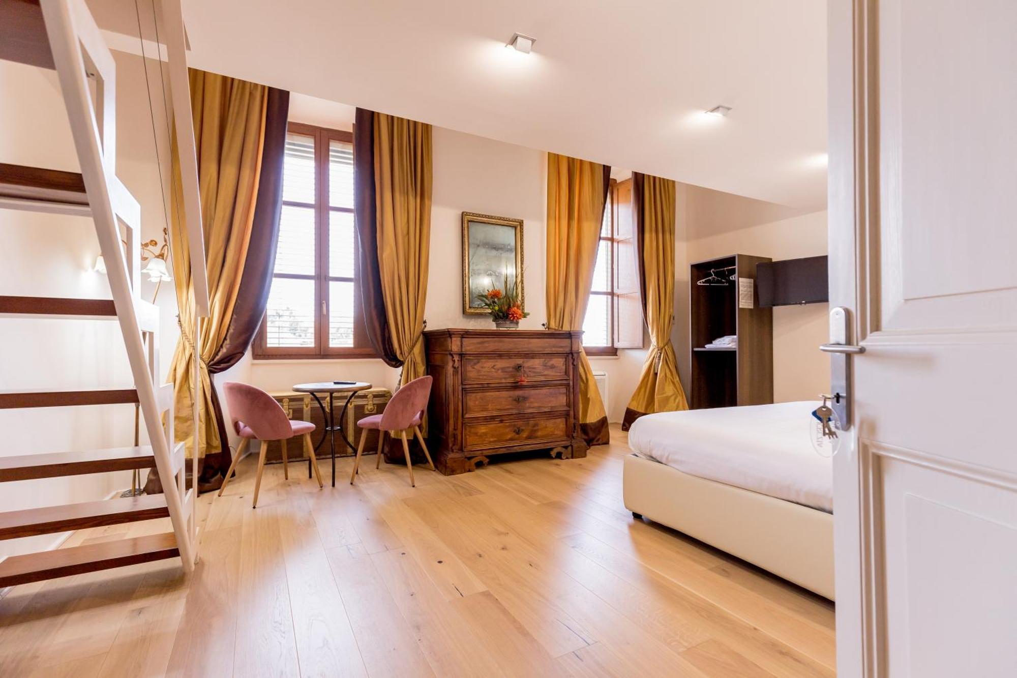 Camera Matrimoniale Deluxe con 1 Letto Supplementare